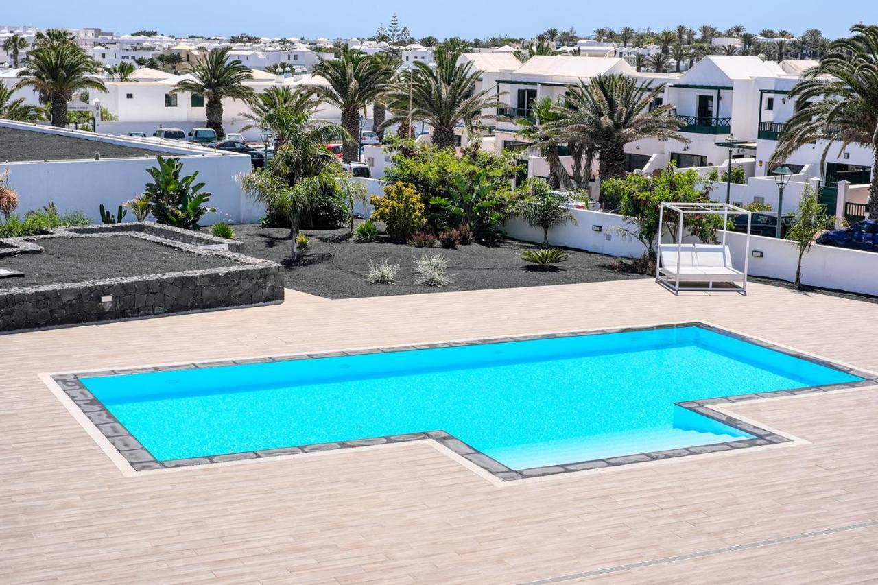 Sunset view modern private poolside apartment Costa Teguise Buitenkant foto