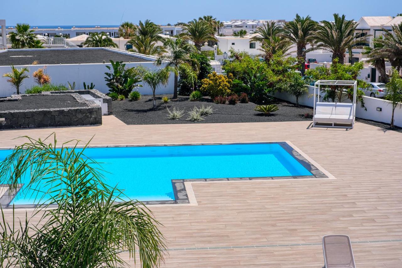 Sunset view modern private poolside apartment Costa Teguise Buitenkant foto